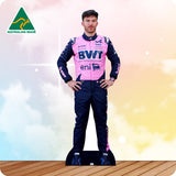 Person wearing a racing suit with various sponsor logos on a colorful background
