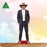 Cardboard standee of a man in a suit and cowboy hat with 'Australian Made' logo on a colorful background.