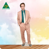Man in a peach suit with a colorful background and Australian Made logo.