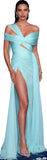 Woman wearing a light blue evening gown with a high slit on a white background