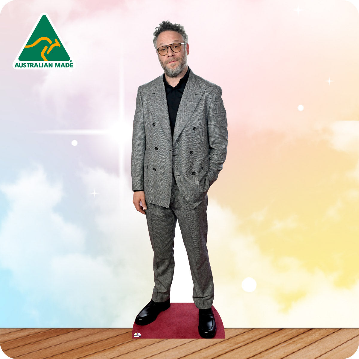 Cardboard cutout of a person in a gray suit with 'Australian Made' logo in the corner.