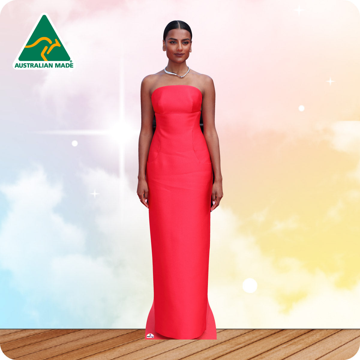 Woman in a red evening gown on a colorful background with 'Australian Made' logo.