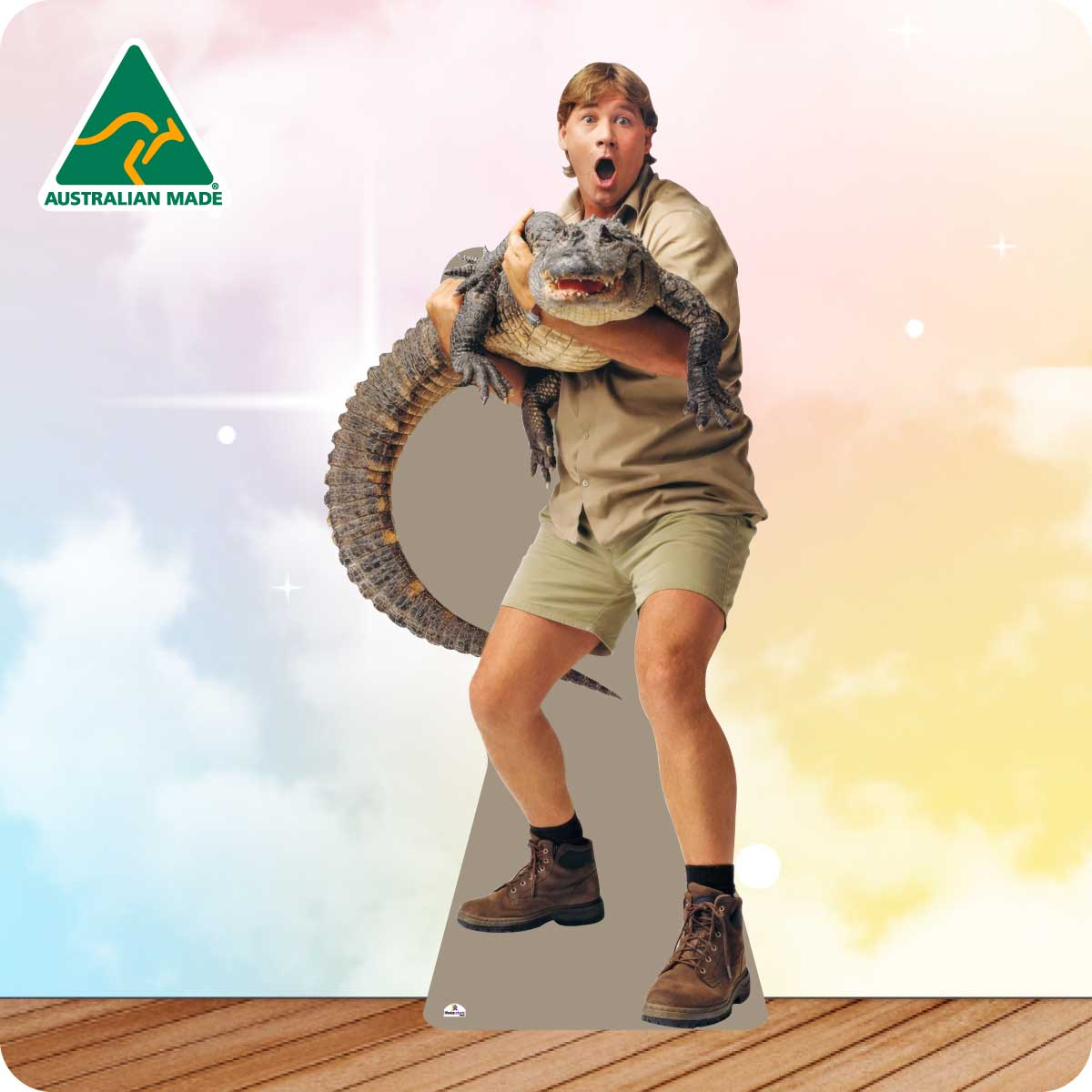 Cardboard cutout of a person holding an alligator with 'Australian Made' logo in the corner.
