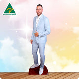 Cardboard cutout of a man in a light blue suit with 'Australian Made' logo in the corner.