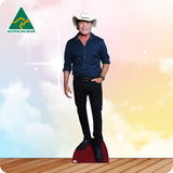 Cardboard cutout of a man wearing a cowboy hat with 'Australian Made' logo in the corner.