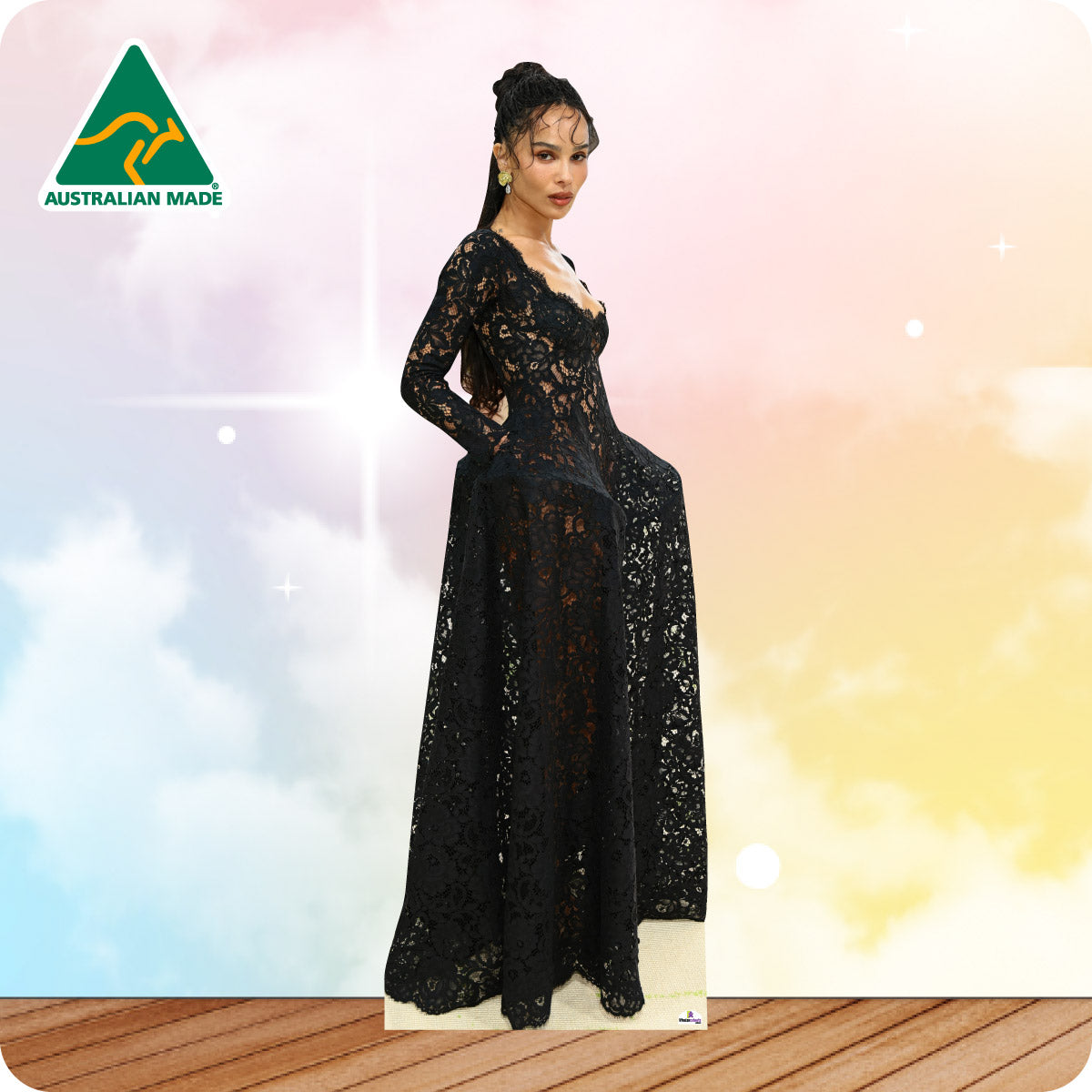 Woman in a black evening gown on a colorful background with 'Australian Made' logo.