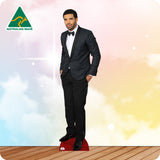 Cardboard cutout of a man in a black suit with 'Australian Made' logo in the corner.