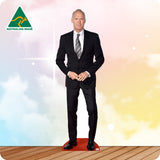 Cardboard cutout of a man in a suit with 'Australian Made' logo on a colorful background
