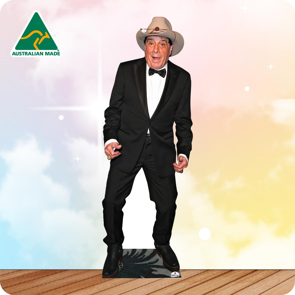 Molly Meldrum Cardboard Cutout wearing a black suit and a brown cowboy hat